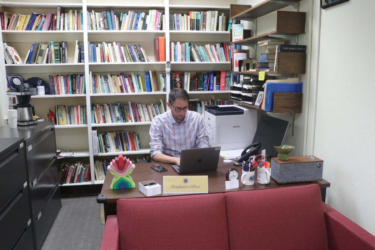 Schuyler Vogel in his office in the Chapel, where he often meets with students and faculty.