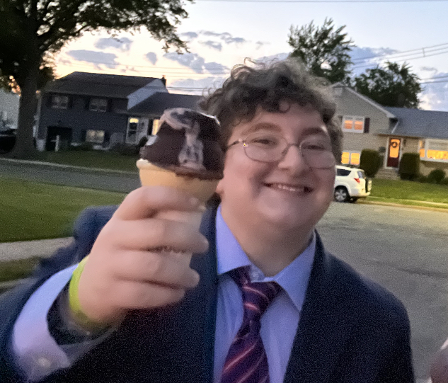 Isaac Kofsky holding an ice cream cone.