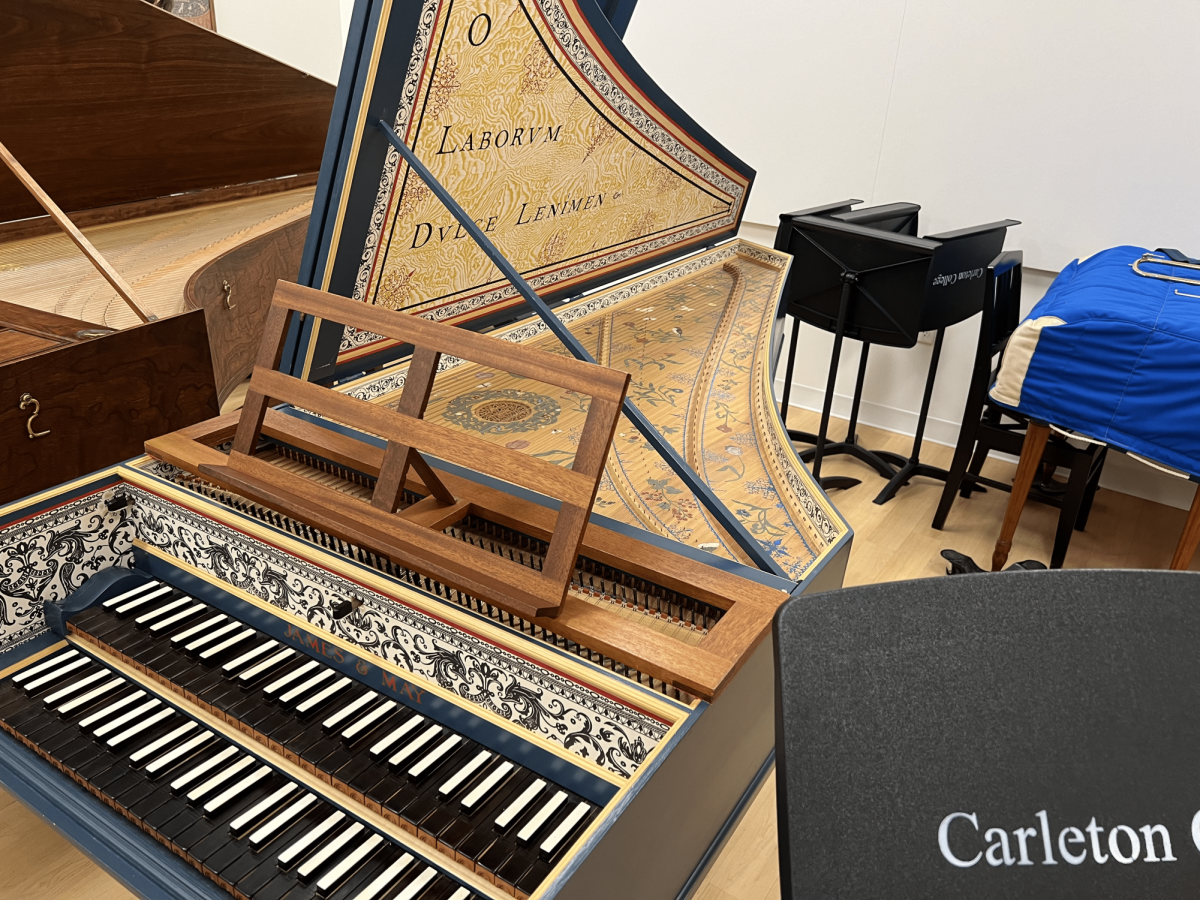 Ornate gold and dark blue harpsichord