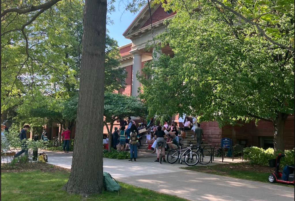 Students gather outside Laird for a protest in favor of divesting