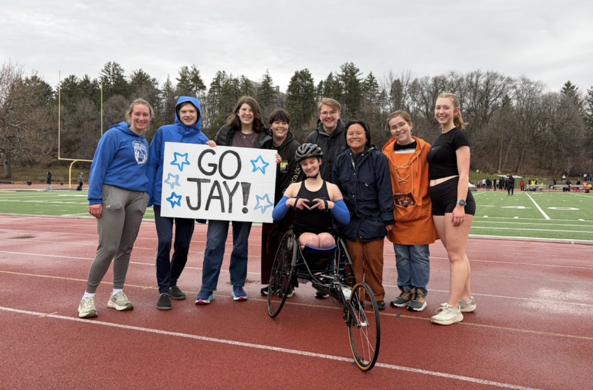 Coleman and supporters at the April 11 meet hosted at St. Olaf’s Klein Field at Manitou.